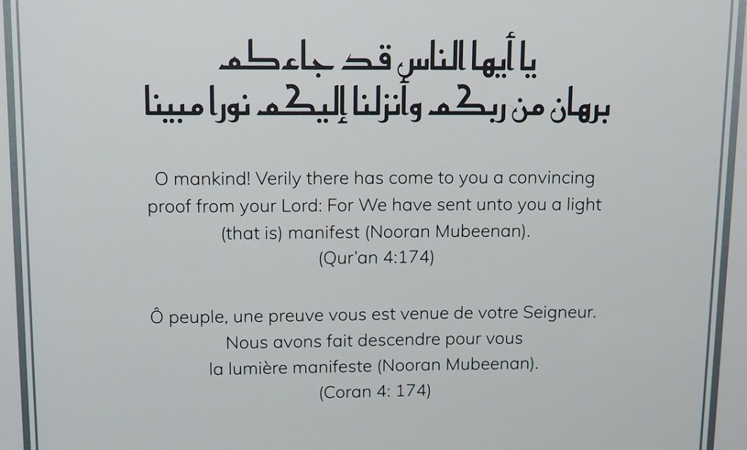 Information booklet main page with Quranic ayat/