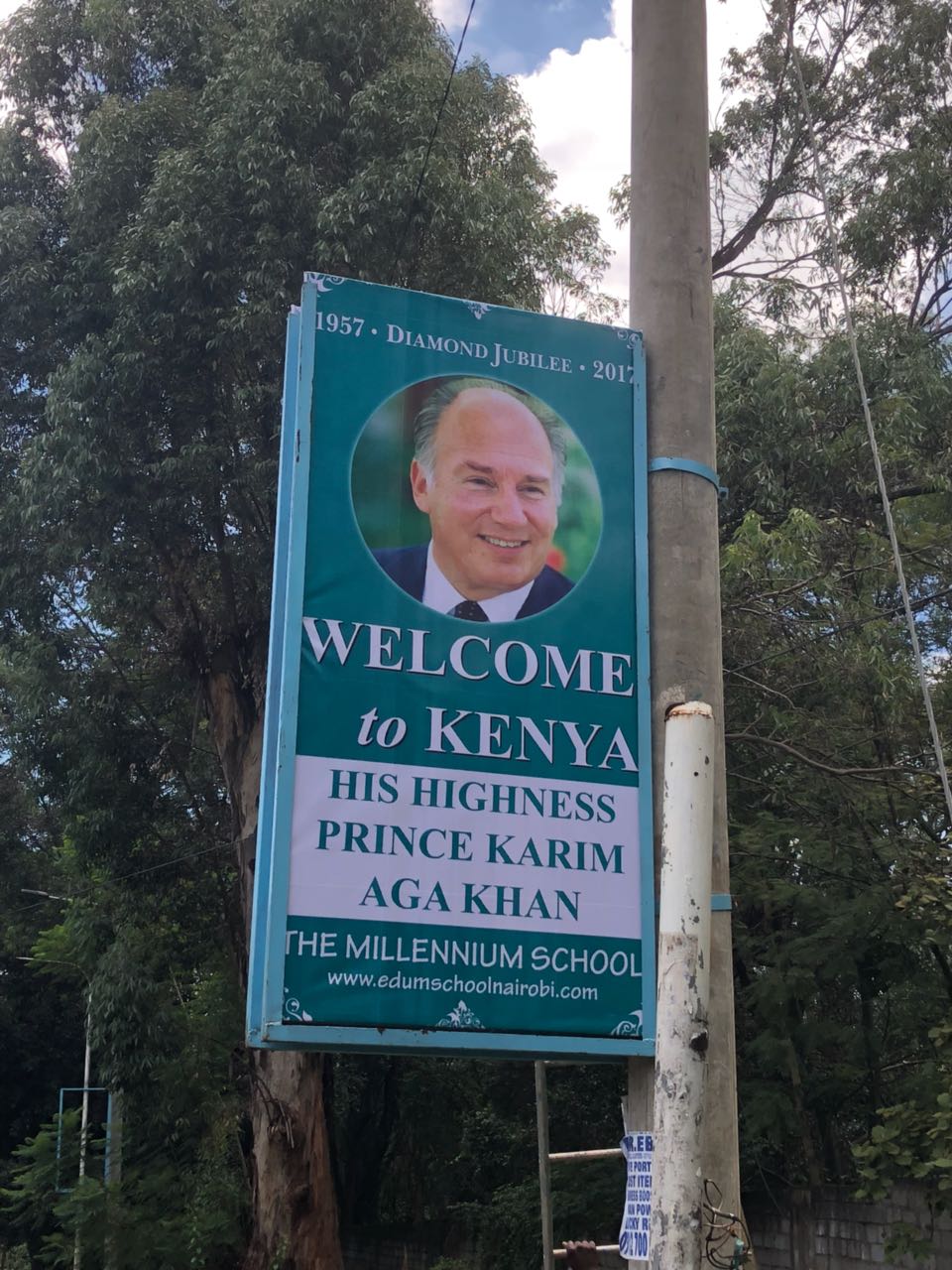 2018-04-12-PHOTO-Aga Khan Visit Kenya Billboard at a school