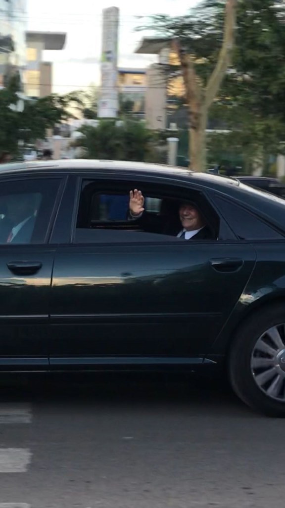 Aga Khan Diamond Jubilee Kenya waves as his motorcade passes a street in Nairobi 2