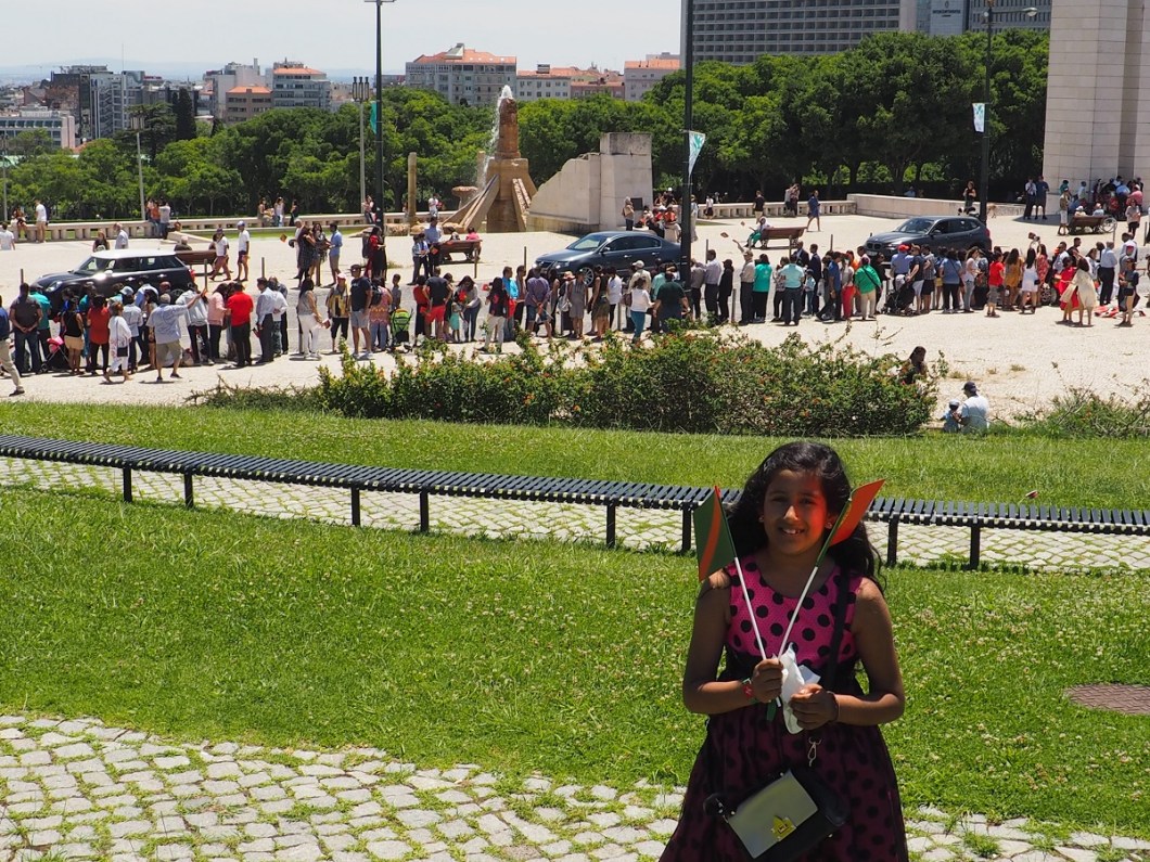 Ismaili girl with Imamat and Portugal flags