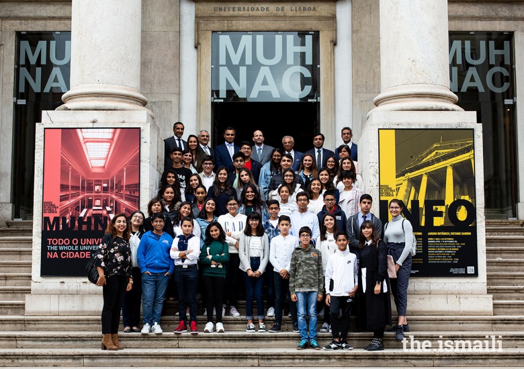 Prince Hussain poses for a group photograph with secondary students from the Lisbon Jamat’s Talim (religious education) classes, at the National Museum of Natural History and Science in Lisbon. 
José Fernandes