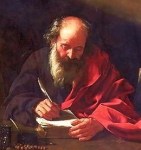 An elderly man with a beard, dressed in a red robe, is seated at a table, writing with a quill on parchment. He appears deep in thought, with a focused expression.