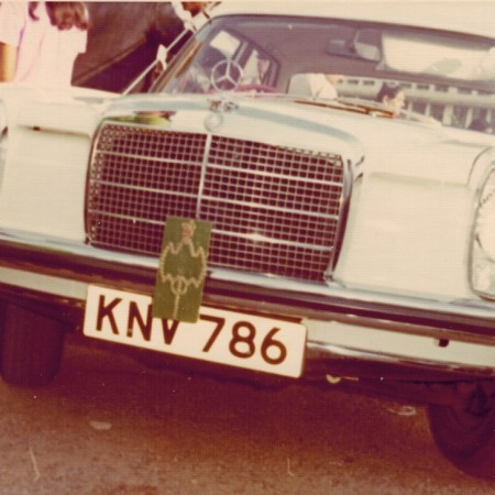 Aga Khan's Mercedes Benz bearing the number plate 786 with his crest and flag, Uganda 1972