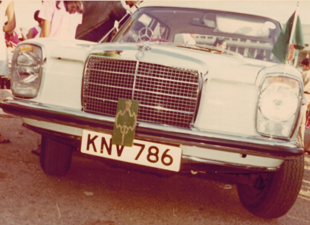 Aga Khan's Mercedes Benz bearing the number plate 786 with his crest and flag, Uganda 1972