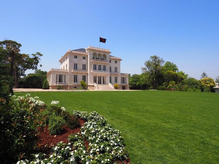 2021: The Personal Standard of Mawlana Hazar Imam, His Highness the Aga Khan, bearing the crest of the Imam, flies on top of the Diwan of the Ismaili Imamat in Lisbon, Portugal. Photo: © Simerg.