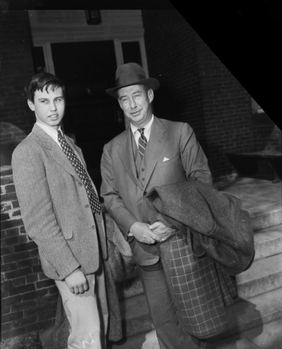 John Fell Stevenson, left, who roomed with Prince Karim Aga Khan at Harvard, with his father Adlai Stevenson (1900 - 1965), t