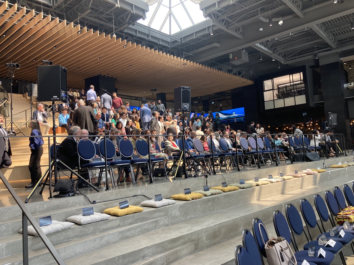 Crowds begin filing up The Ampersand auditorium for Prince Hussain Aga Khan's presentation of his exhibition The Living Sea - Fragile Beauty. The event was hosted by the University of Calgary on May 18, 2023.