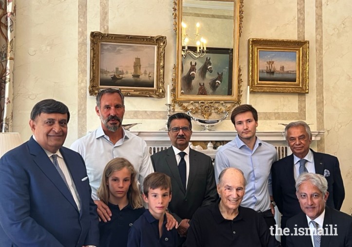 Aga Khan with his family members and Ismaili leaders during the presentation of a gift for his 67th Imamat Day