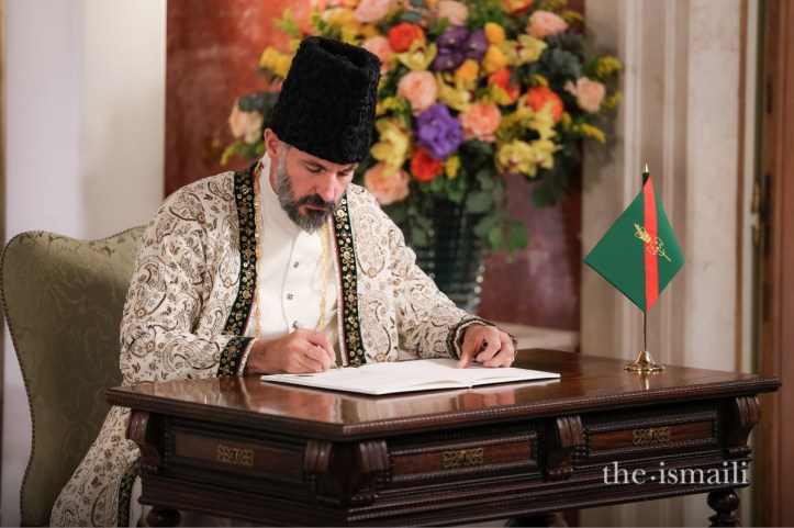 Rahim Aga Khan signs the Ismaili Constitution under his name, Barakah dedicated to the Aga Khan
