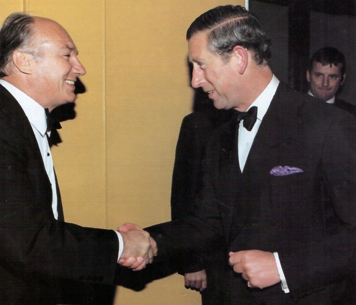 Mawlana Shah Karim and Prince Charles - now His Majesty King Charles III -- at a banquet hosted by Asia House at the Royal Albert Hall London to celebrate the 50th anniversary of India and Pakistan; July 1997. Photograph: The Ismaili Canada, December 1997, page 31.