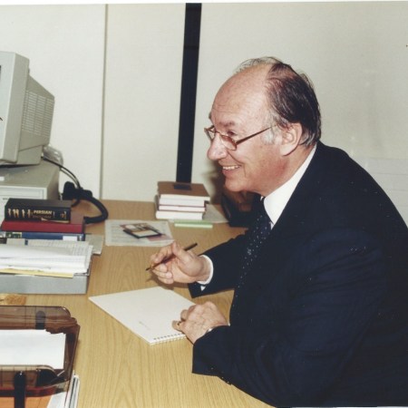 Aga Khan writing a message for the IIS Libarry