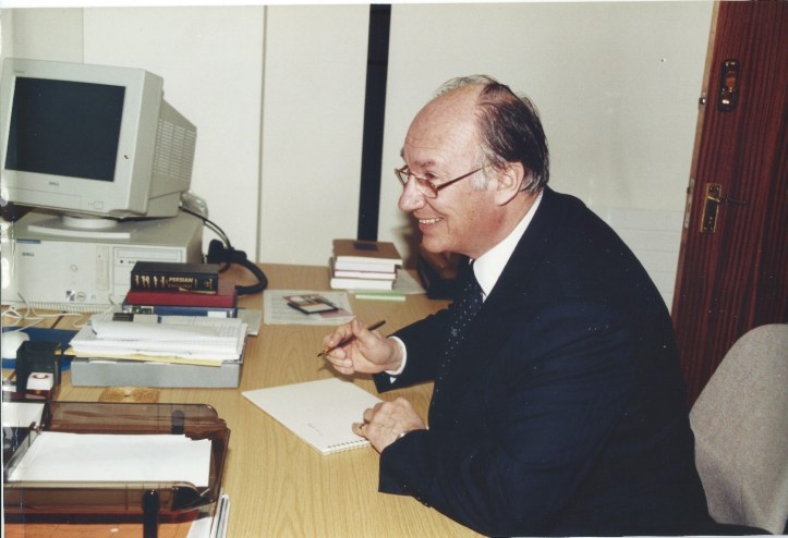 Aga Khan writing a message for the IIS Libarry