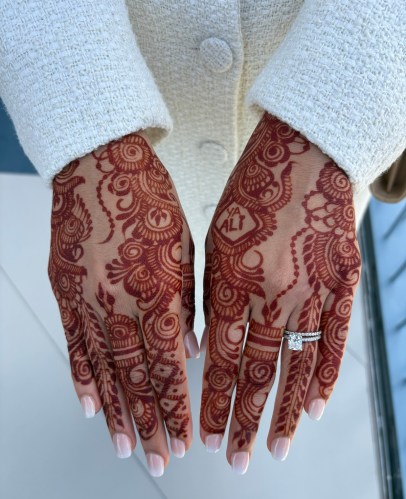 Mehndi, Henna artwork on the hands of a visitor attending the inauguration of Ismaili Center, Houston