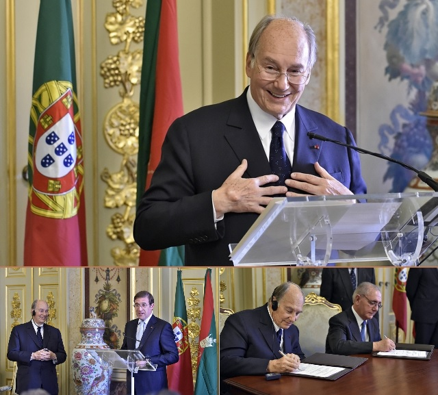 Mawlana Shah Karim, His Highness the Aga Khan, delivers a speech at a ceremony in Portugal, with national flags in the background.