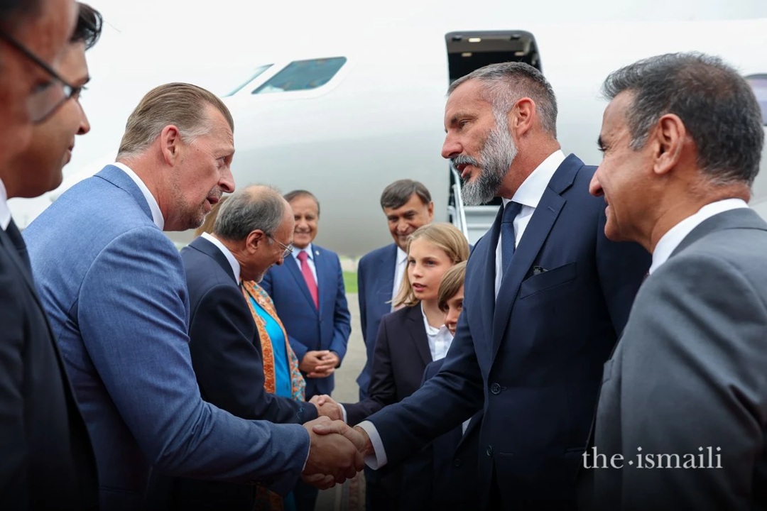 Aga Khan with his sons arriving in Calgary
